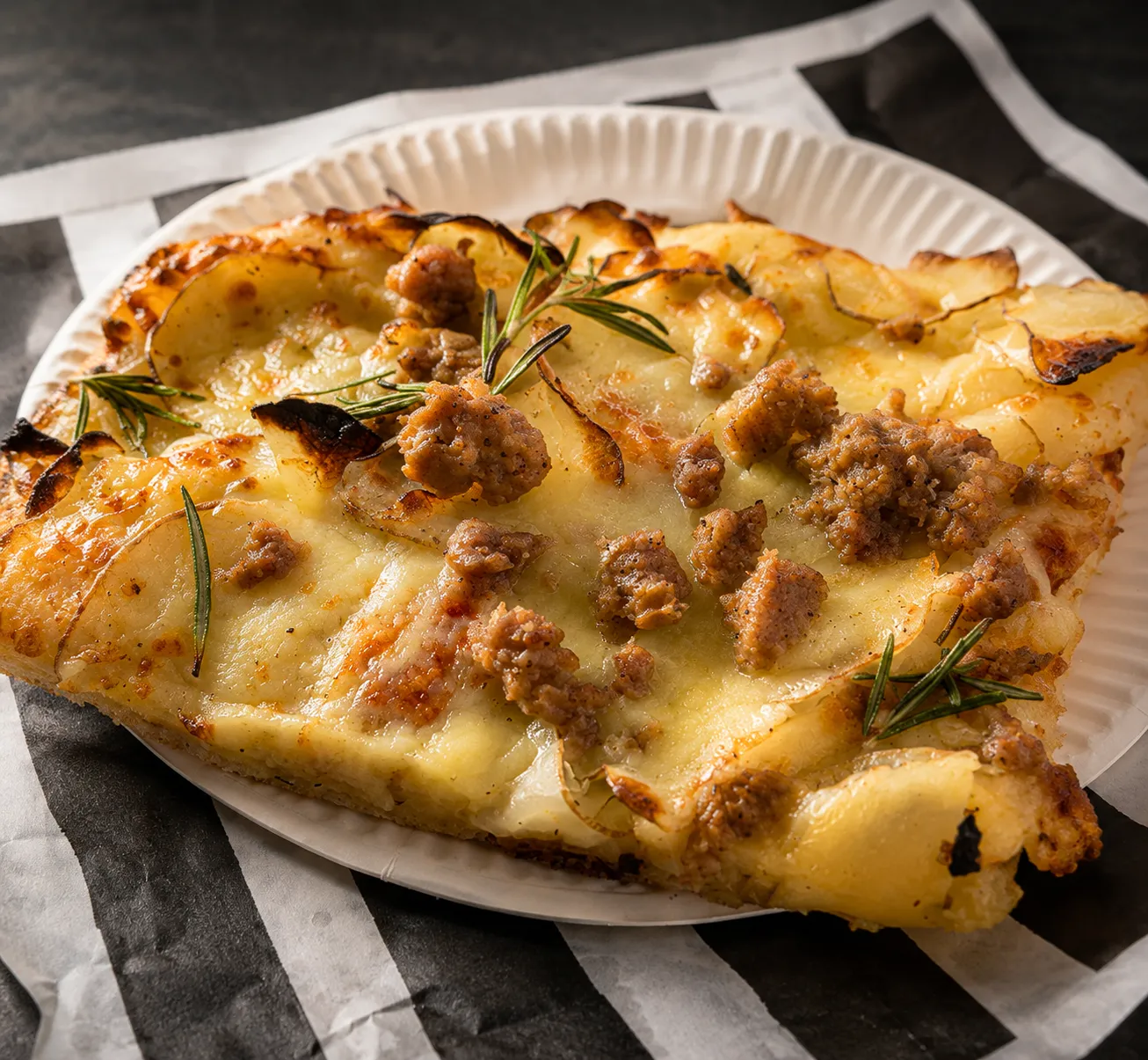 Patate e Salsiccia Roman pizza with thinly sliced potato, rosemary and roasted Venetian sausage at Castelli Mercato, Ancaster